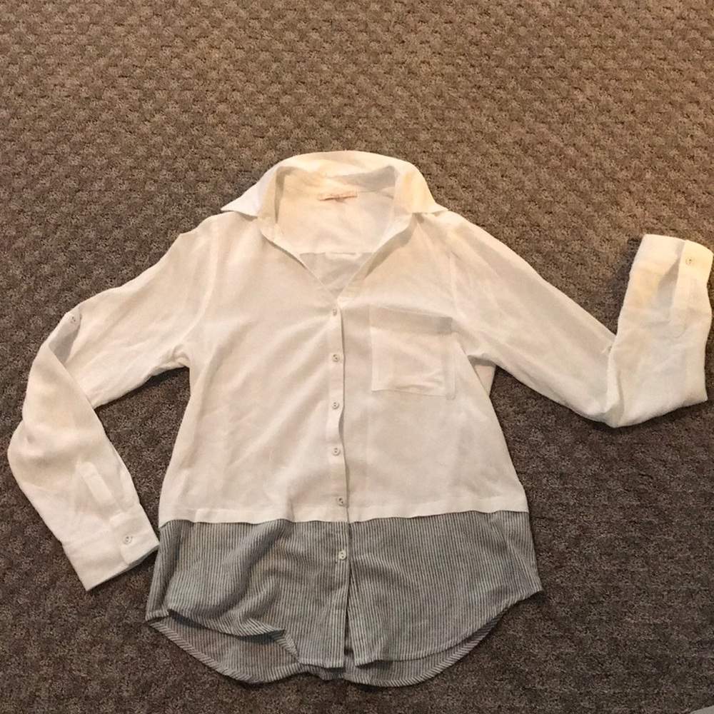 white button down with blue stripes at bottom